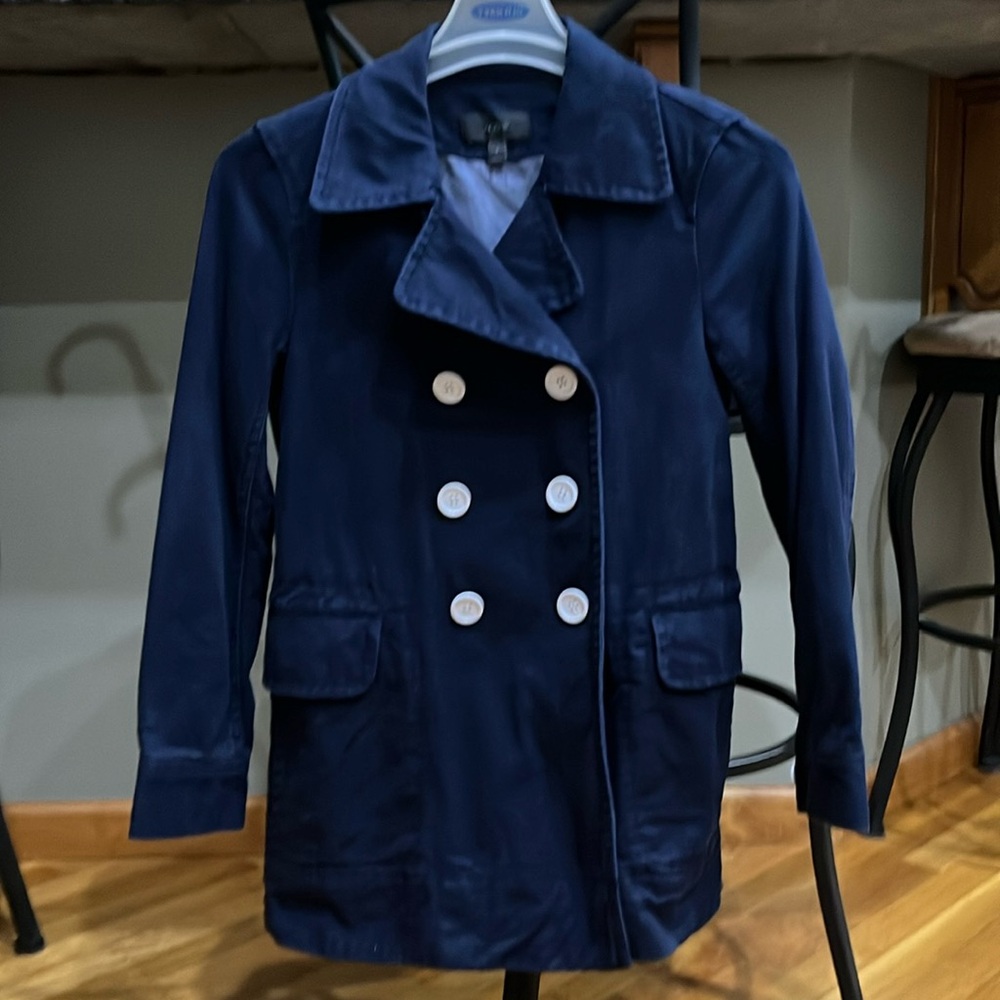 J. Crew navy peacoat. So well made!! White buttons provide bright contrast!